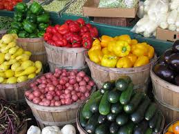 farmers market Bushel baskets full of garden produce