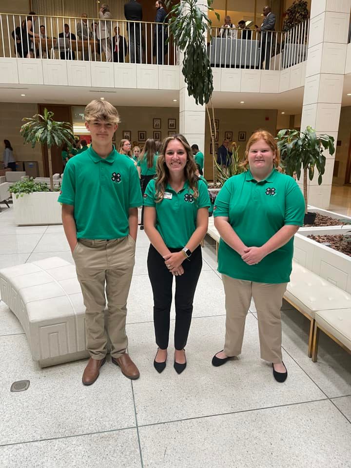 Alamance 4-H members Noah and Lexie with Agent Sarah in the NC Legislative Building