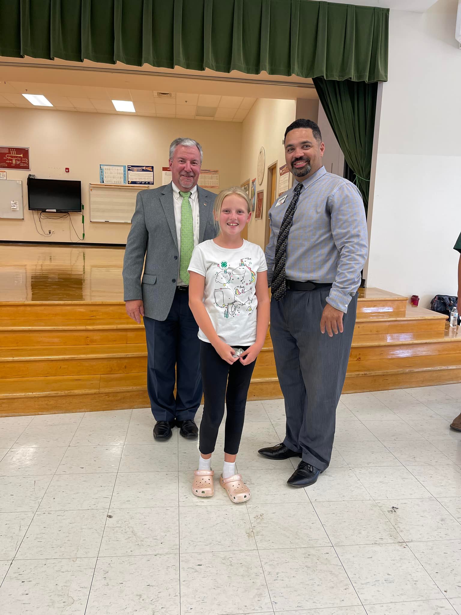 Emmy Kernodle with Dr. Mike Yoder, Director of NC 4-H, and Mr. Tyrone Fisher, Interim North Central District Extension Director.